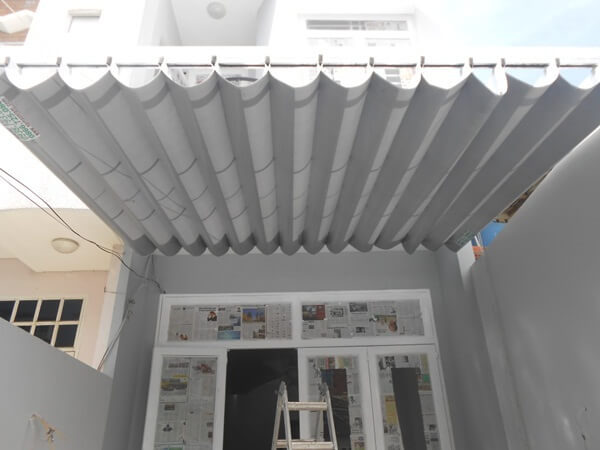 Địa chỉ thi công lắp đặt mái xếp lượn sóng TPHCM